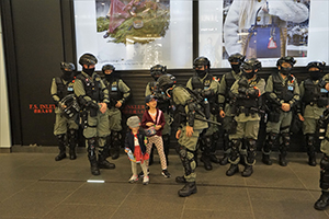 Children with police in riot gear, Canton Road, Tsim Sha Tsui, 26 December 2019