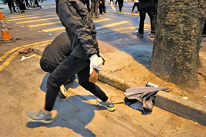 Throwing bricks to block the street, Luard Road, Wanchai, 1 January 2020