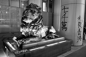 A vandalized lion sculpture outside the Hong Kong Bank Building, Central, 1 January 2020
