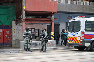 Police in riot gear on Johnston Road, Wanchai, 1 January 2020