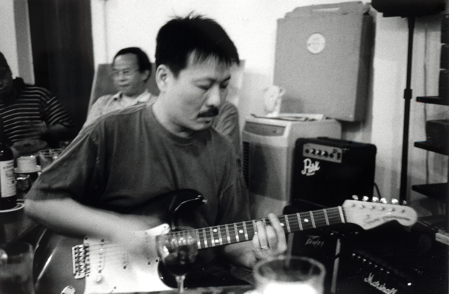 Yank Wong playing guitar, Club 64, Wing Wah Lane, Central, 26 June 1999 ...